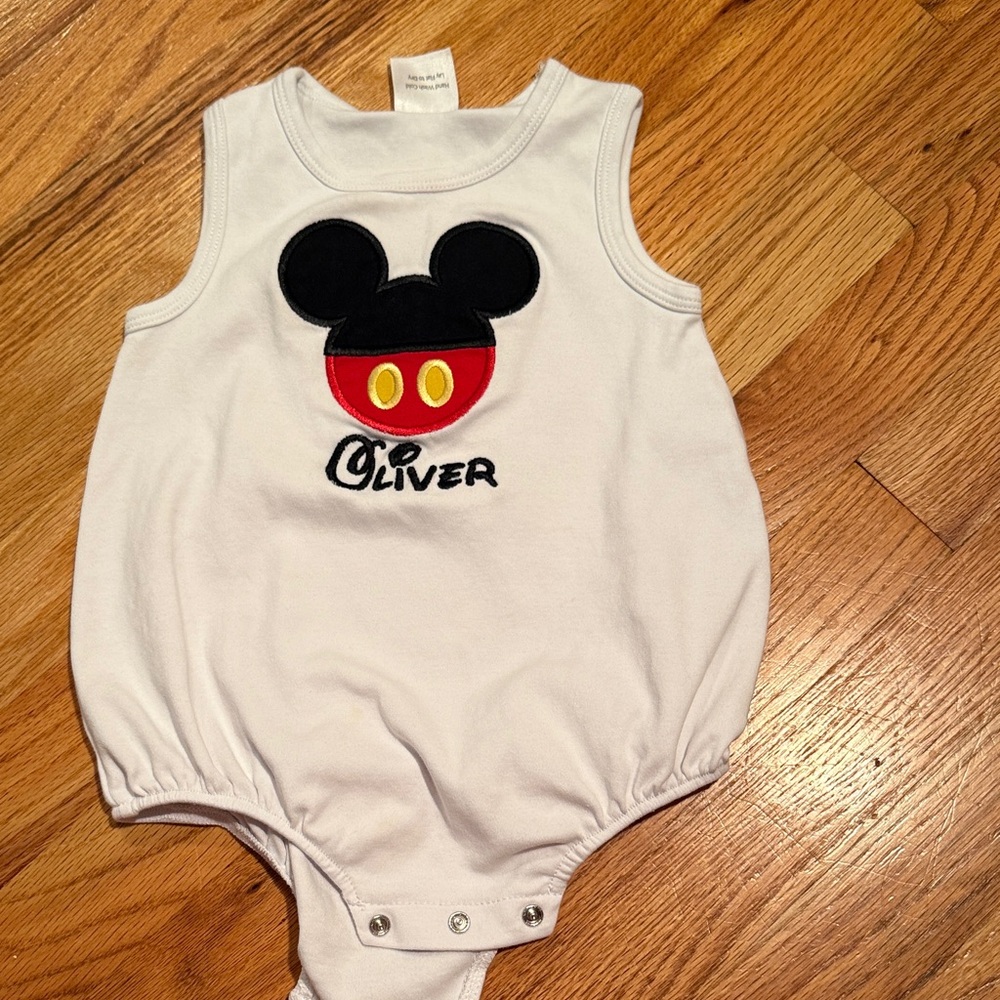 Nola White Baby Onesie with Black Design